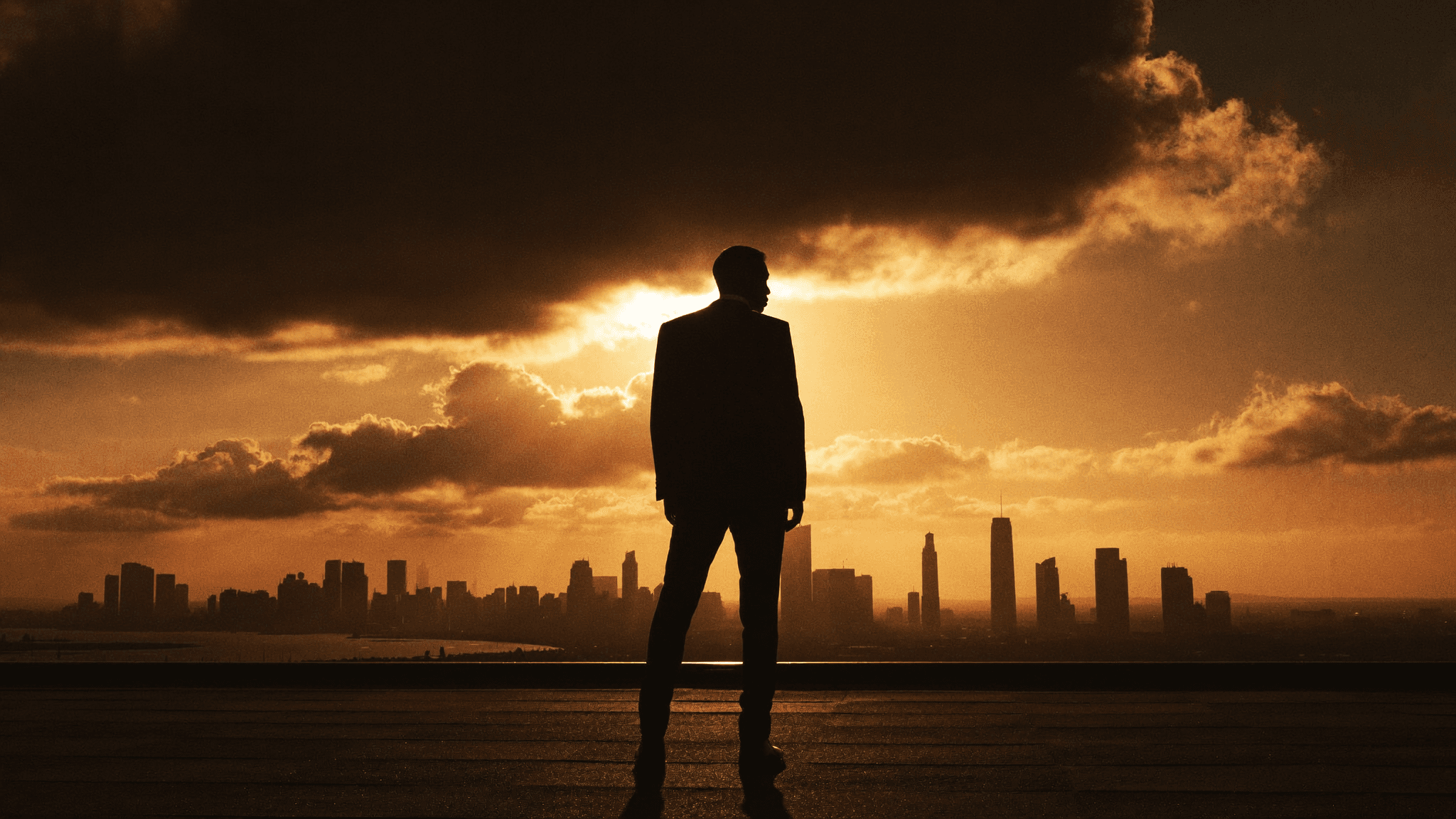 A leader overlooking the city at golden hour